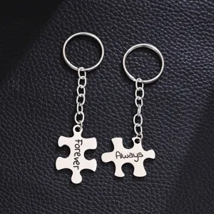 Stainless steel couple puzzle keychain detail, engraved with forever and always words.