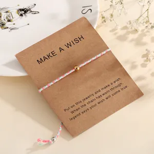 Adjustable braided cord bracelet with gold bead and wish card for women fashion jewelry gift.