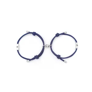 Stainless steel blue rope couple magnetic bracelets featuring sun and moon charm details.