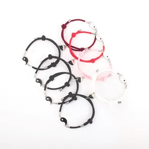 Fashion Milan rope couple bracelets with magnetic Tai Chi charms in multiple colors for sale.