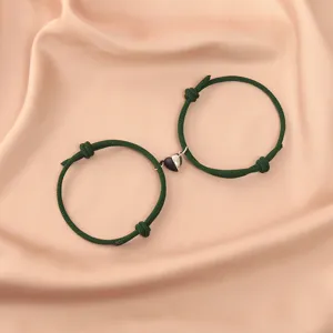Couple magnetic heart woven rope bracelet set, stylish matching friendship jewelry.