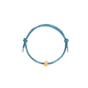 Blue black woven paracord survival bracelet detail with adjustable knots and bead accent.