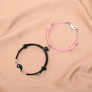 Matching couple magnetic attraction braided rope bracelets set for men and women lovers.