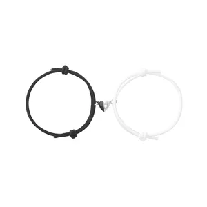 Couple matching black and white braided rope bracelets with magnetic heart charm for lovers