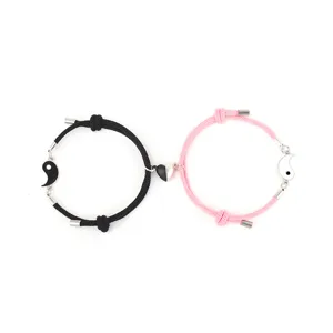 Couple magnetic tai chi braided bracelet set, black and pink matching design for lovers.