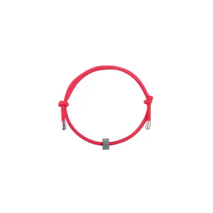 Detail view of the red nylon rope survival bracelet featuring a grey tungsten carbide bead.