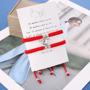 Set di bracciali per coppie magnetici intrecciati rossi fatti a mano con cuore.