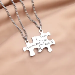 Stainless steel couple puzzle pendant necklace set with engraved love text for lovers.