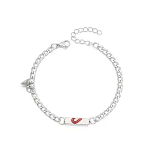 Pulsera de pareja magnética de acero inoxidable detalle con cadena y dije de corazón.