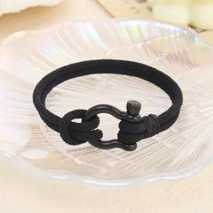 Bracelet homme noir en acier inoxydable avec manille tressee style marin tres tendance