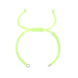 Closeup of fluorescent green DIY braided cord bracelet with adjustable flat sliding knot.