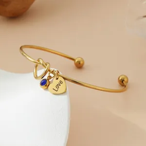 Bracelet jonc en acier inoxydable doré avec pendentif cœur et pierre bleue bijou tendance