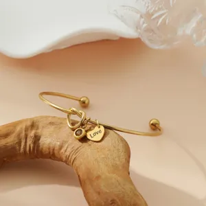 Bracelet jonc en acier inoxydable doré avec pendentif cœur et charm cristal cadeau.