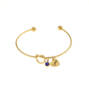 Bracelet jonc en acier inoxydable doré avec pierre de naissance bleue et pendentif cœur