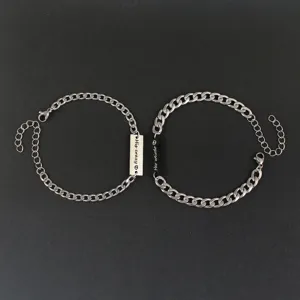 Stainless steel couple bracelet set with engraved charm, matching fashion jewelry for lovers.