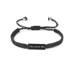 Adjustable black woven rope couple bracelet with stainless steel engraved metal plate.