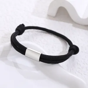 Handmade black paracord stainless steel tube bracelet detail view, minimalist unisex jewelry design.
