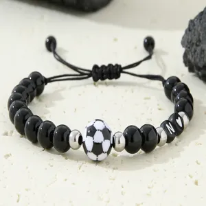 Handmade black beaded bracelet with soccer football charm and adjustable woven cord for men