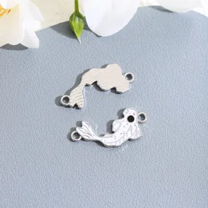 Closeup shot of alloy yin yang fish DIY connectors, dual loop charms for handmade jewelry making.