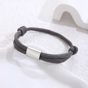 Handmade braided paracord stainless steel bracelet detail view, minimalist unisex wristband.