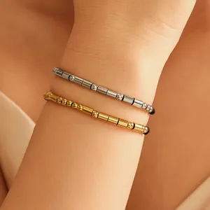 Stainless steel Morse code couple bracelets set featuring gold and silver bead styles.