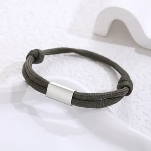 Stainless steel paracord bracelet detail, handmade woven rope design for daily wear.