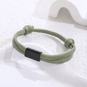 Handmade braided paracord stainless steel bracelet with black metal tube detail for daily wear.
