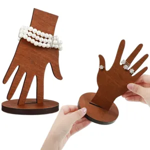 Wooden hand jewelry display stand, creative ring and bracelet organizer for desktop decor.