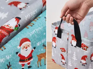 Panier de Noel detail du tissu, joli motif festif de pere Noel et gros plan poignee solide.