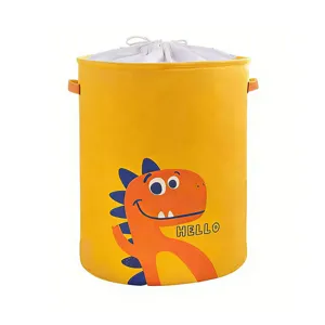 Cute yellow fabric laundry hamper with dinosaur print, waterproof storage basket with drawstring.