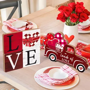 Valentine's Day wooden table decor detail showcasing love blocks and truck centerpiece.