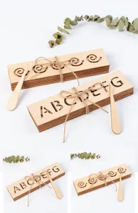 Ensemble de planche de pratique de contrôle de stylo en bois avec lettres et spirales pour enfants.