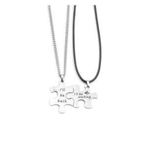 Stainless steel couple puzzle necklace detail view, matching engraved pendants for lovers.