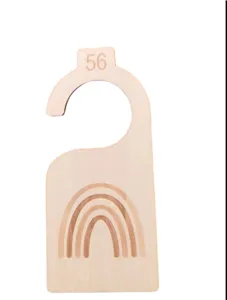 Wooden baby closet divider with rainbow design and size 56 newborn wardrobe organizer.