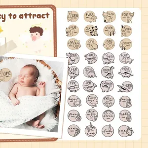 Wooden baby milestone cards set with cute animal and dinosaur designs for monthly growth photos.