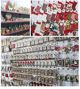 Christmas wooden houses and hanging stockings holiday party decoration wholesale display.