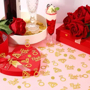 Bride to be wedding party gold glitter confetti, diamond ring and diamond table scatter.