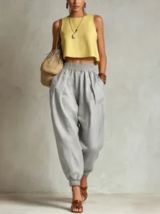 Pantalon harem ample en coton et lin pour femme, taille élastique et chevilles serrées.