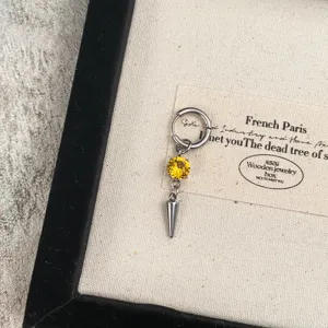 Punk style yellow crystal spike pendant hoop earrings, edgy fashion cool girl jewelry gift.