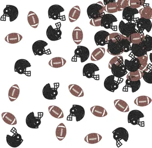 Glitter football confetti table scatter decorations for sports themed party celebration.