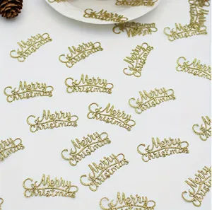 Gold glitter Merry Christmas confetti detail, perfect for holiday party table scatter decor.