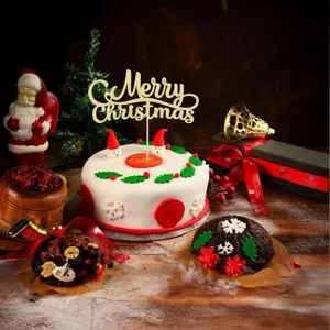 Gold glitter Merry Christmas cake topper for holiday party dessert table decoration.