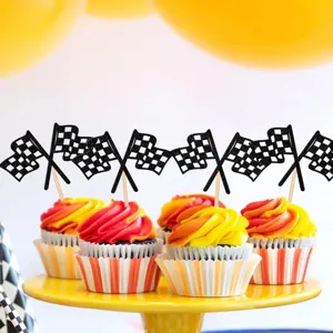 Close up detail shot of black and white checkered flag cupcake toppers for racing party decoration.