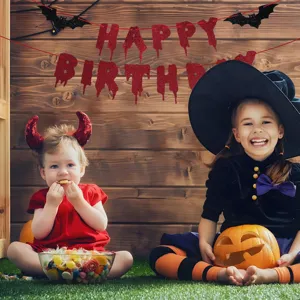 Halloween party banner scene showcasing red bloody glitter letters and hanging bats for decor.
