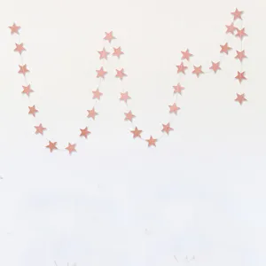 Ghirlanda di carta a stella glitterata rosa per feste di compleanno e decorazioni.
