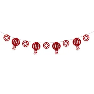 Red glitter Chinese New Year garland featuring festive lanterns and coin decorations for party.