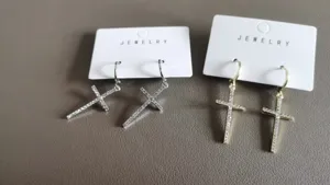 Dazzling rhinestone cross dangle earrings set, stylish metallic cross drop fashion jewelry.