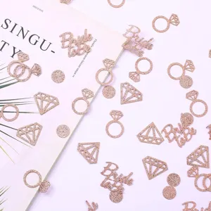 Rose gold glitter bride to be confetti diamond ring shapes for wedding table party decor.