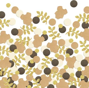 Baby shower confetti decorations, onesie and gold glitter leaf paper pieces set for party.