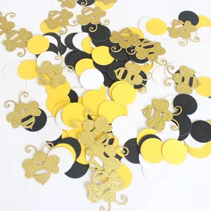 Bee theme birthday party confetti gold glitter bee and black white paper circles table scatter